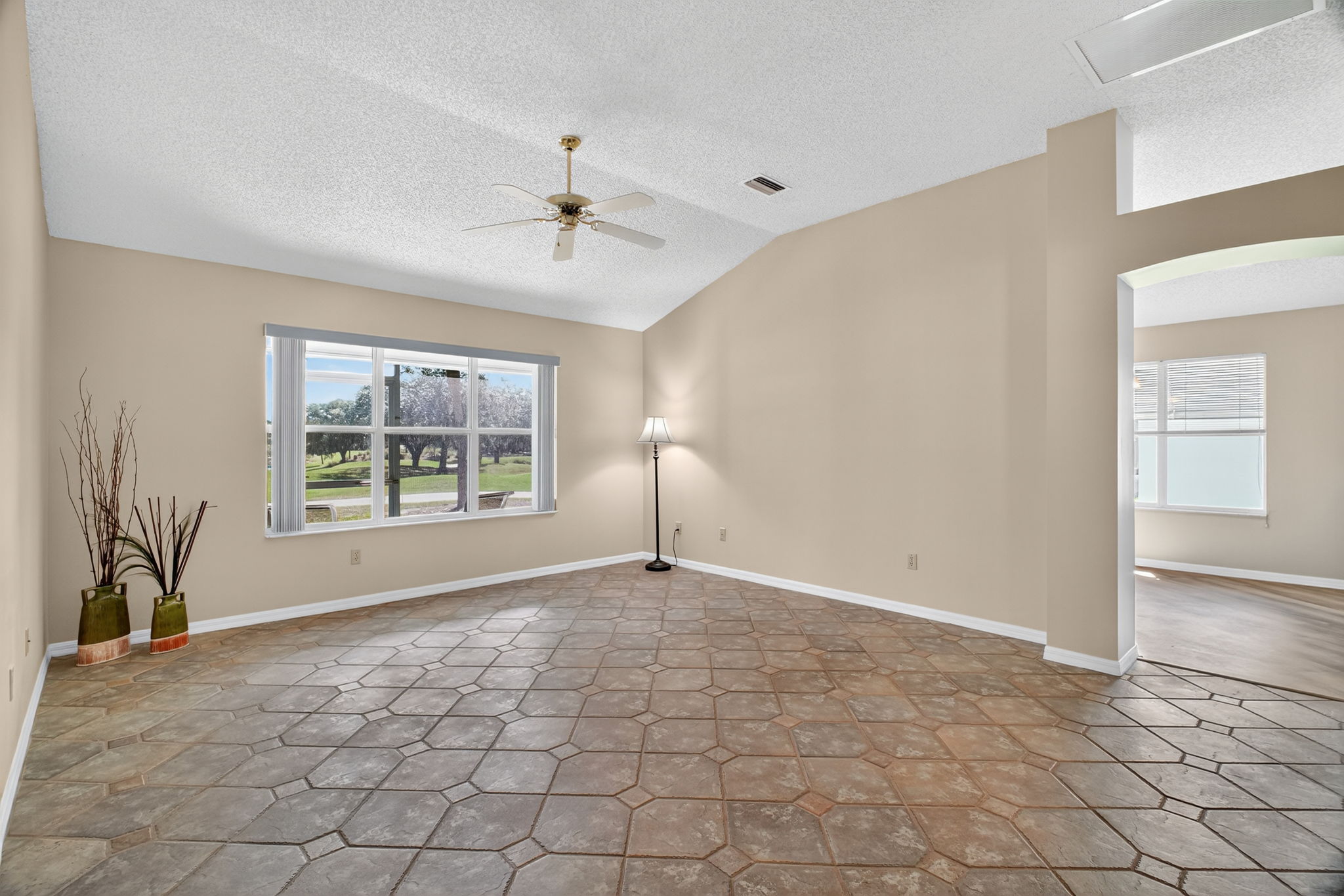 Living Room with Golf and Water Views!