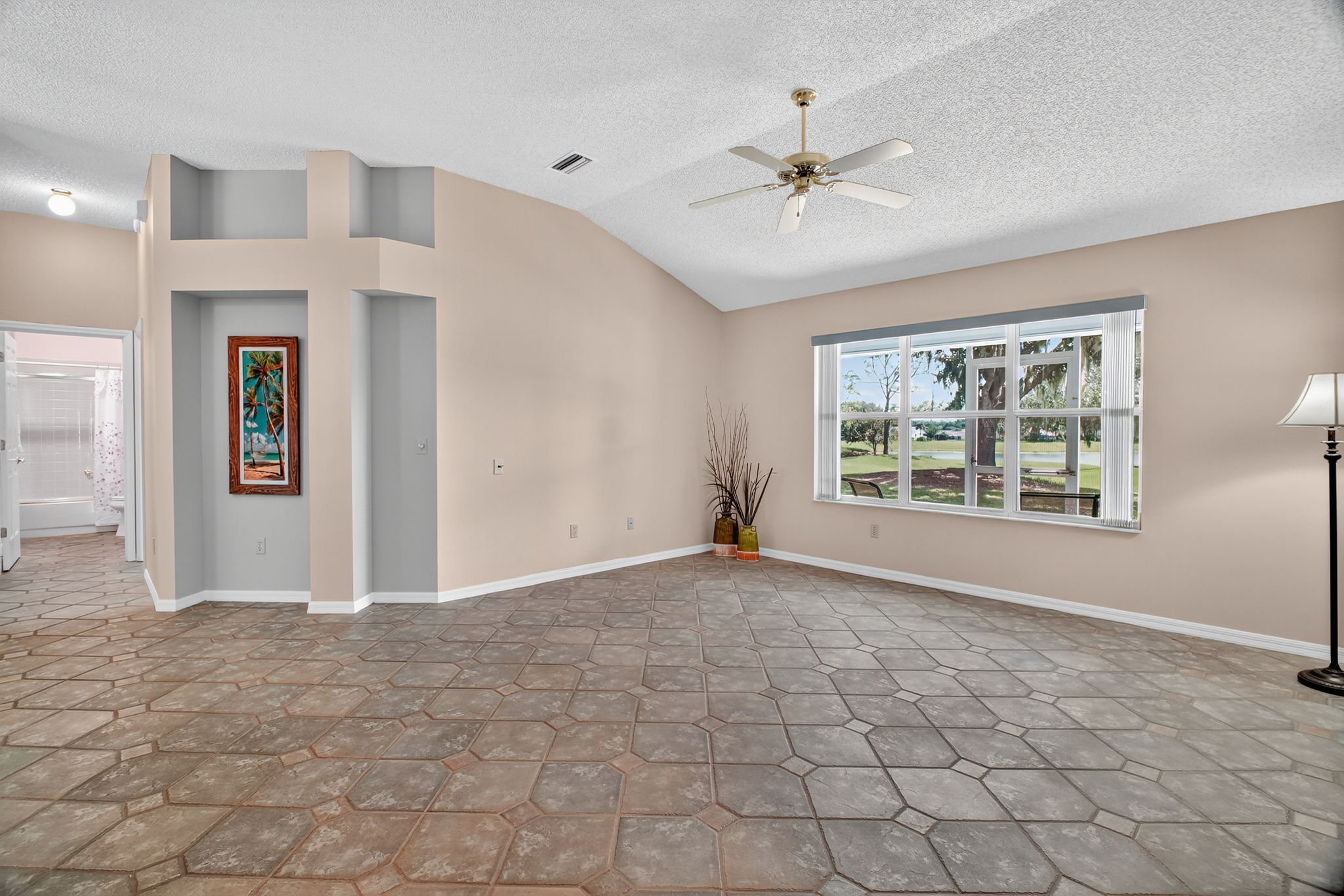 Living Room with Golf and Water Views!