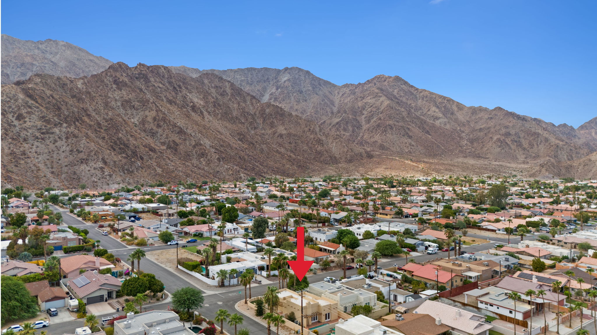 Aerial View of Property and Proximity to Mountains