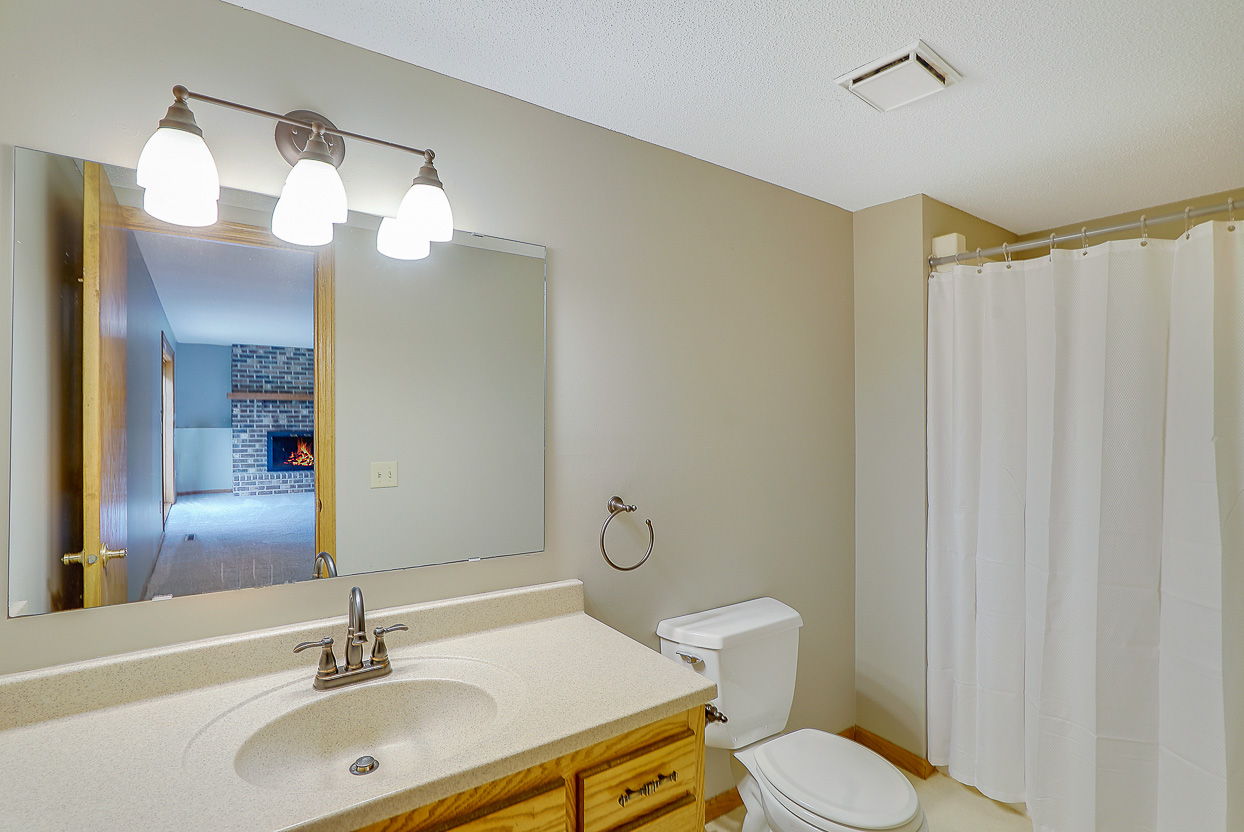 A large 3/4 Bathroom with extra elbow room.