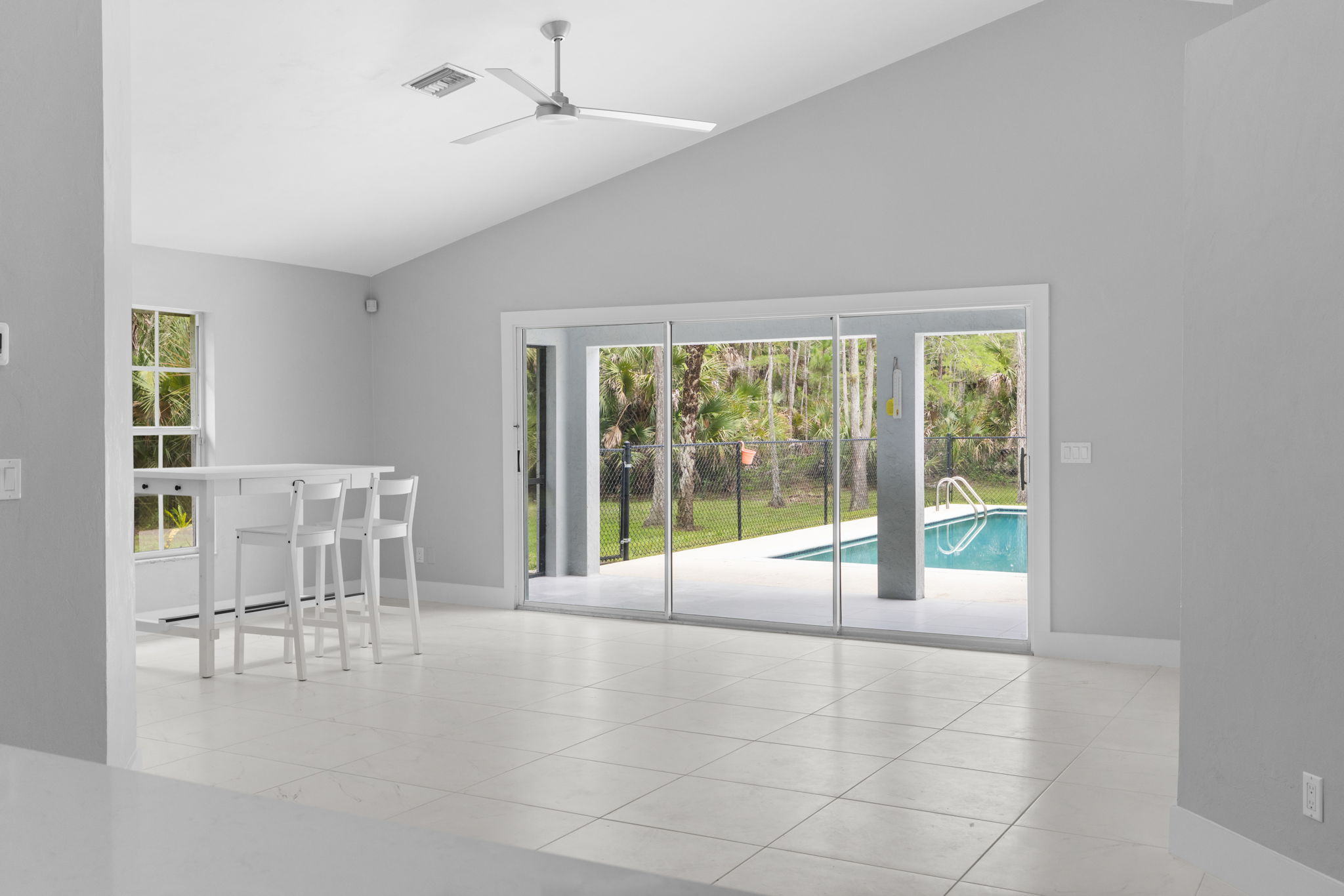 View of the Pool from the Living and Dining Area