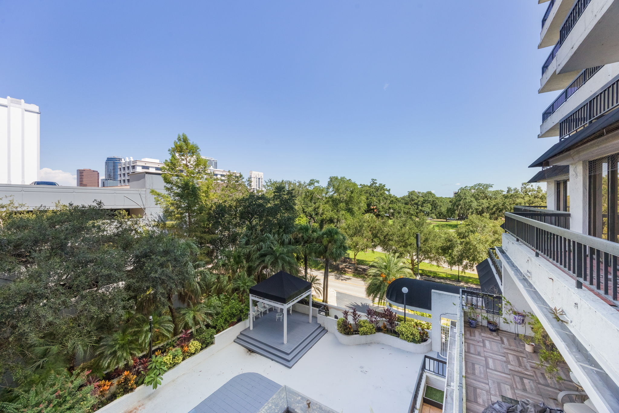 View off the balcony looking to the right. Lake Eola Park lies just across the street.