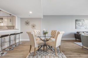 Dining area. The home offers casual bar seating as we as a dedicated more formal dining area.