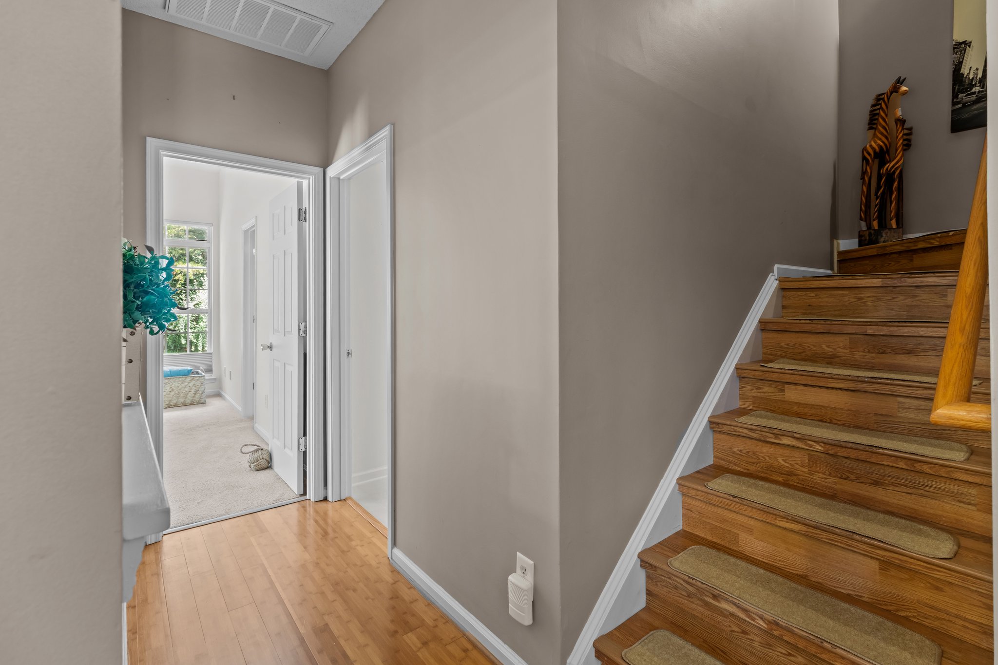 Hallway to bath and Primary bedroom.