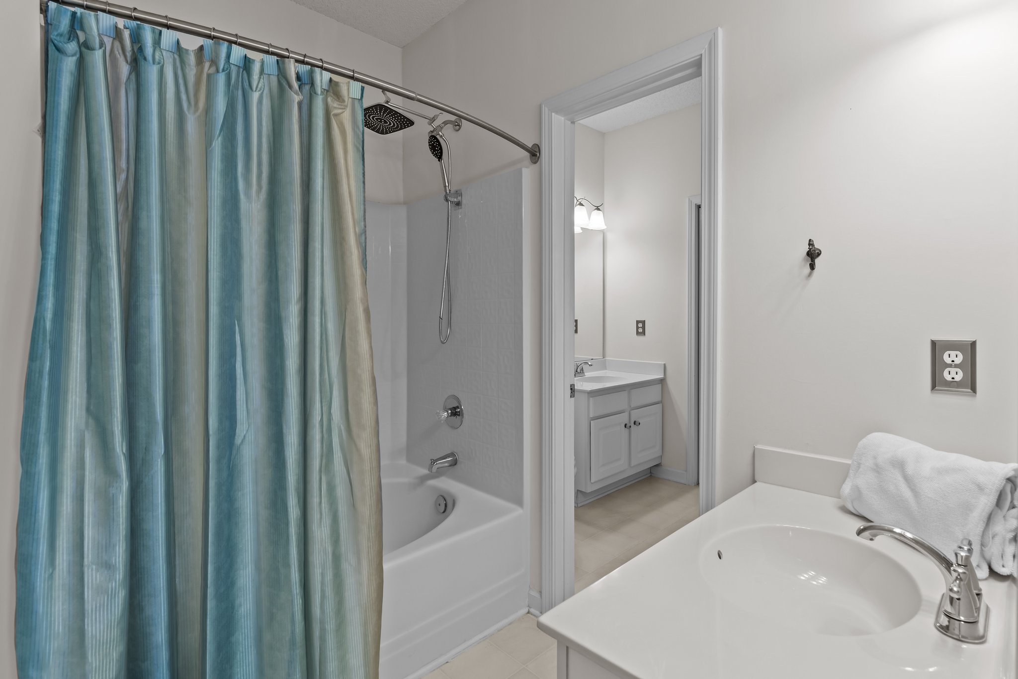 Ensuite bath first floor with laundry room access.