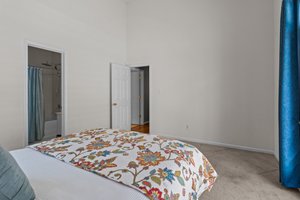 Vaulted ceilings and ensuite bath with walk in closet.