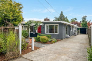 Discover this storybook starter home in Seward Park, a peaceful haven on a quiet dead-end street.