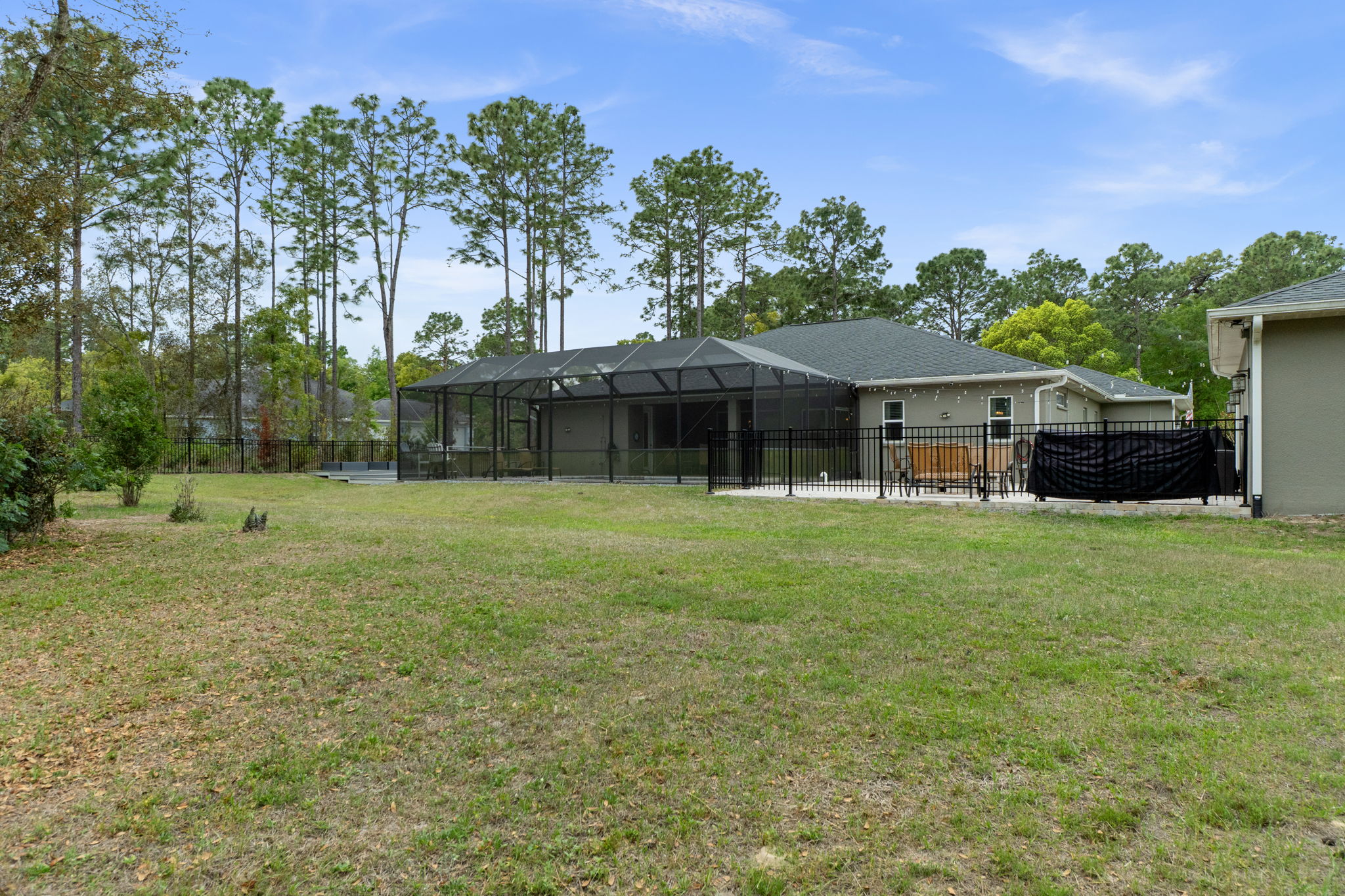 Looking from back of lot toward house from opposite corner.