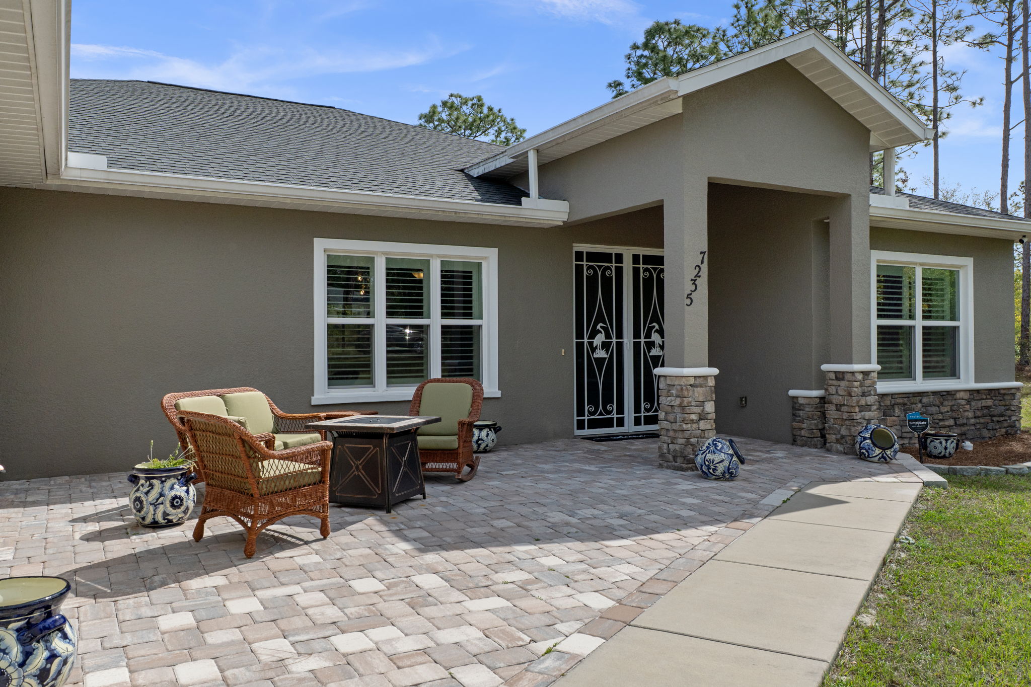 The welcoming front patio adds to the curb appeal of the home.