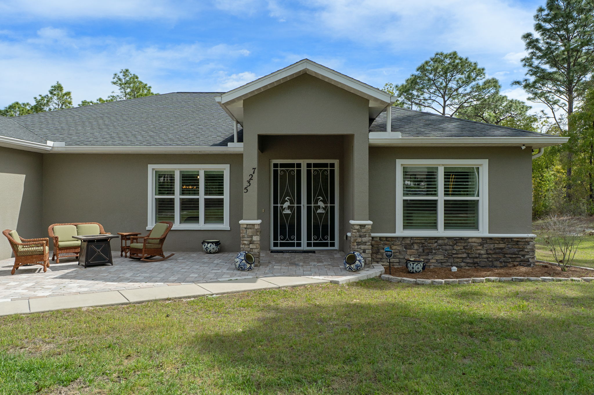 You'll appreciate the covered front double door entry.