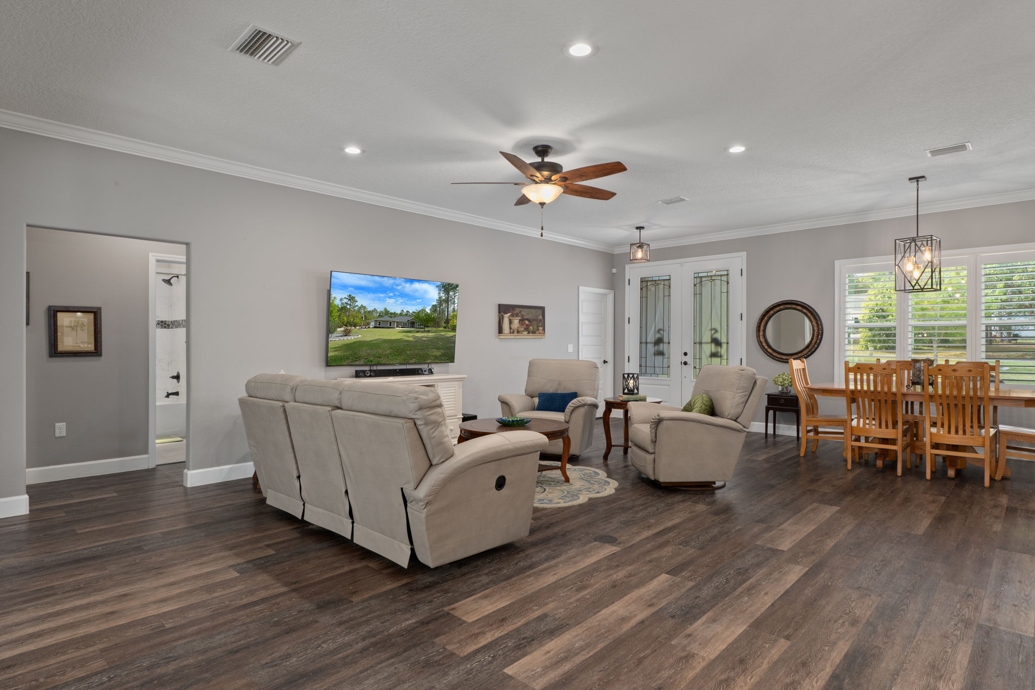 Looking from the breakfast nook, across the great room toward the front entry.