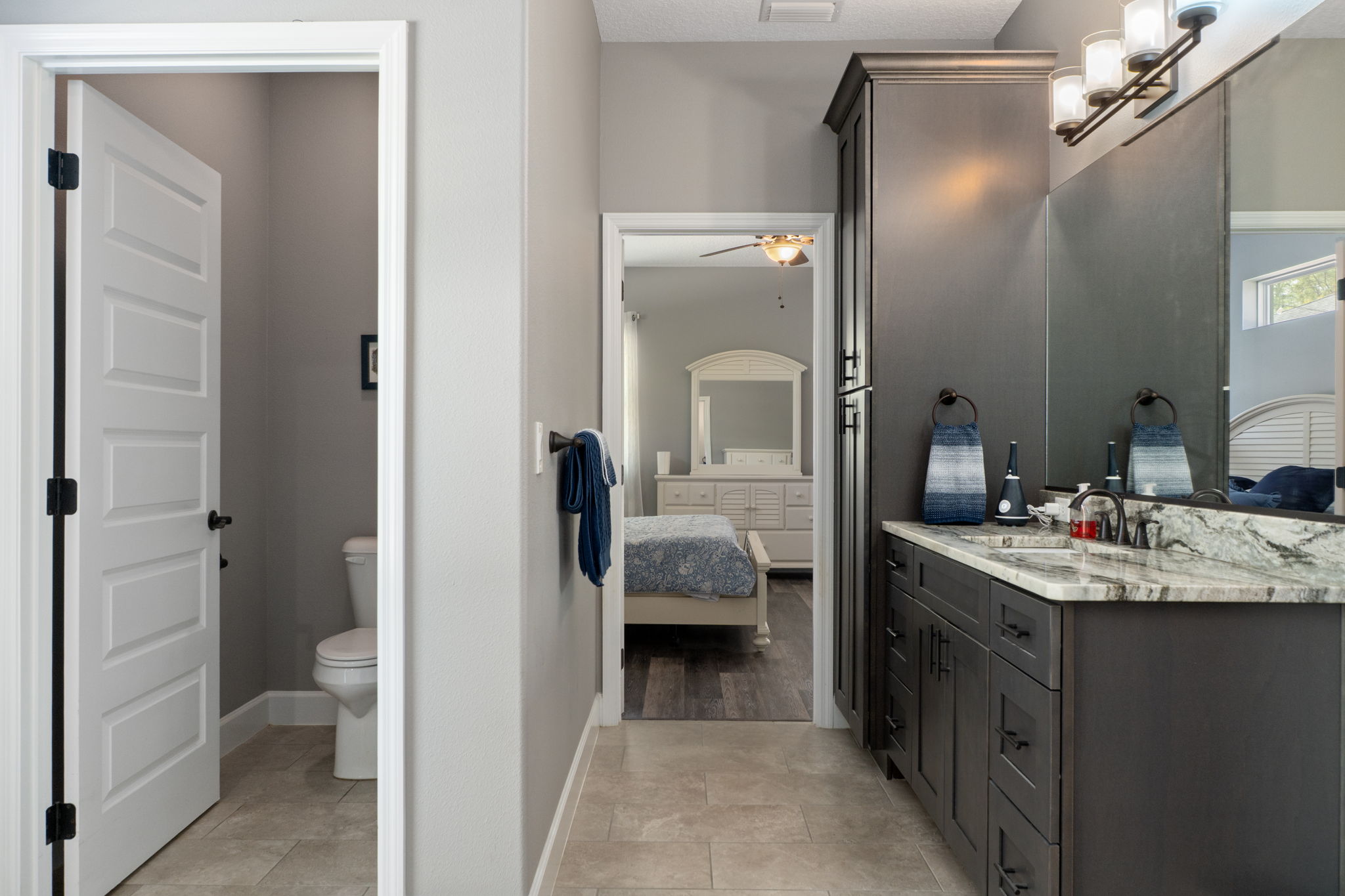 View from shower looking back into the primary bedroom.
