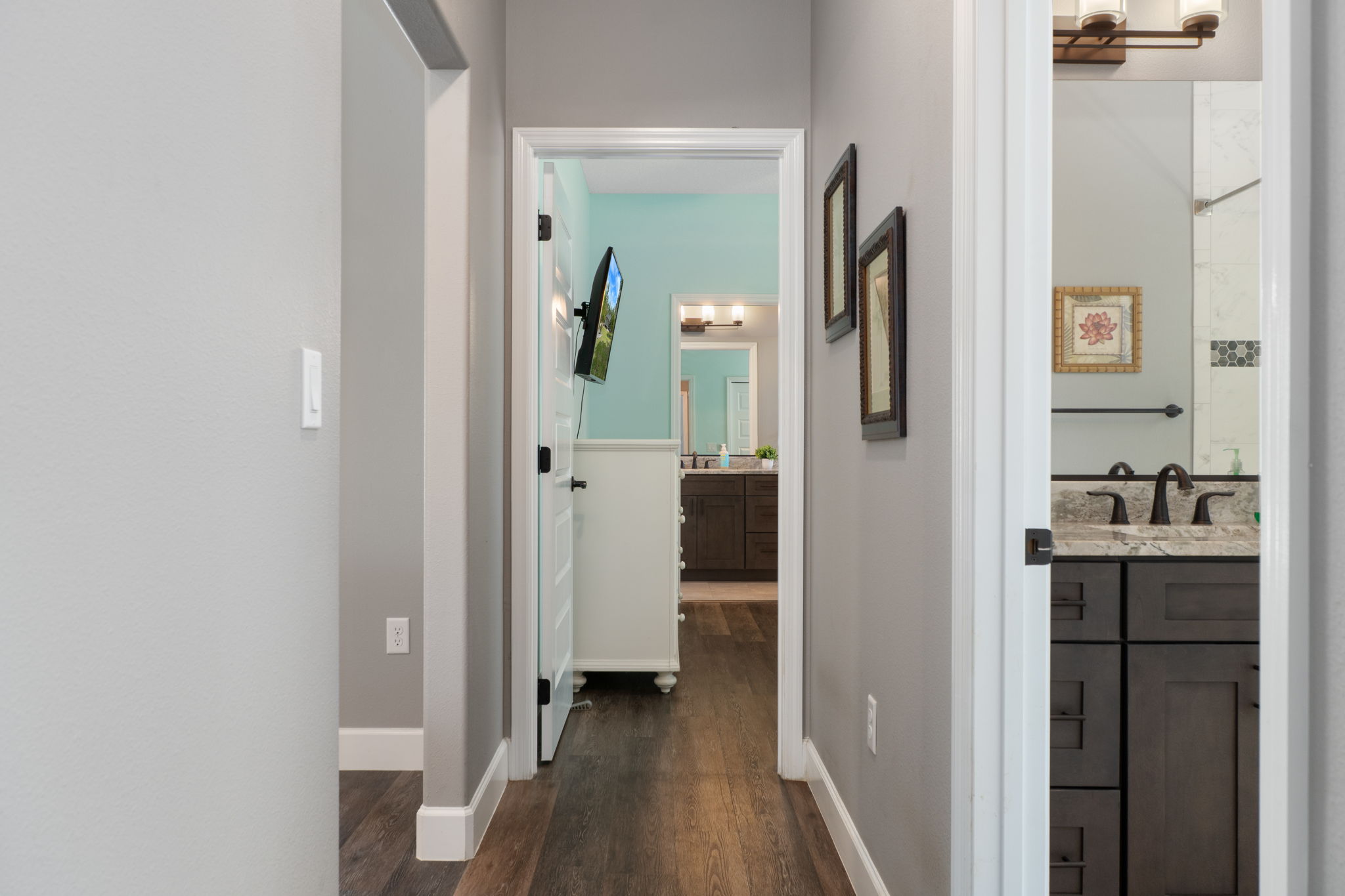 Looking down the guest hallway to the alternate ensuite guest bedroom.