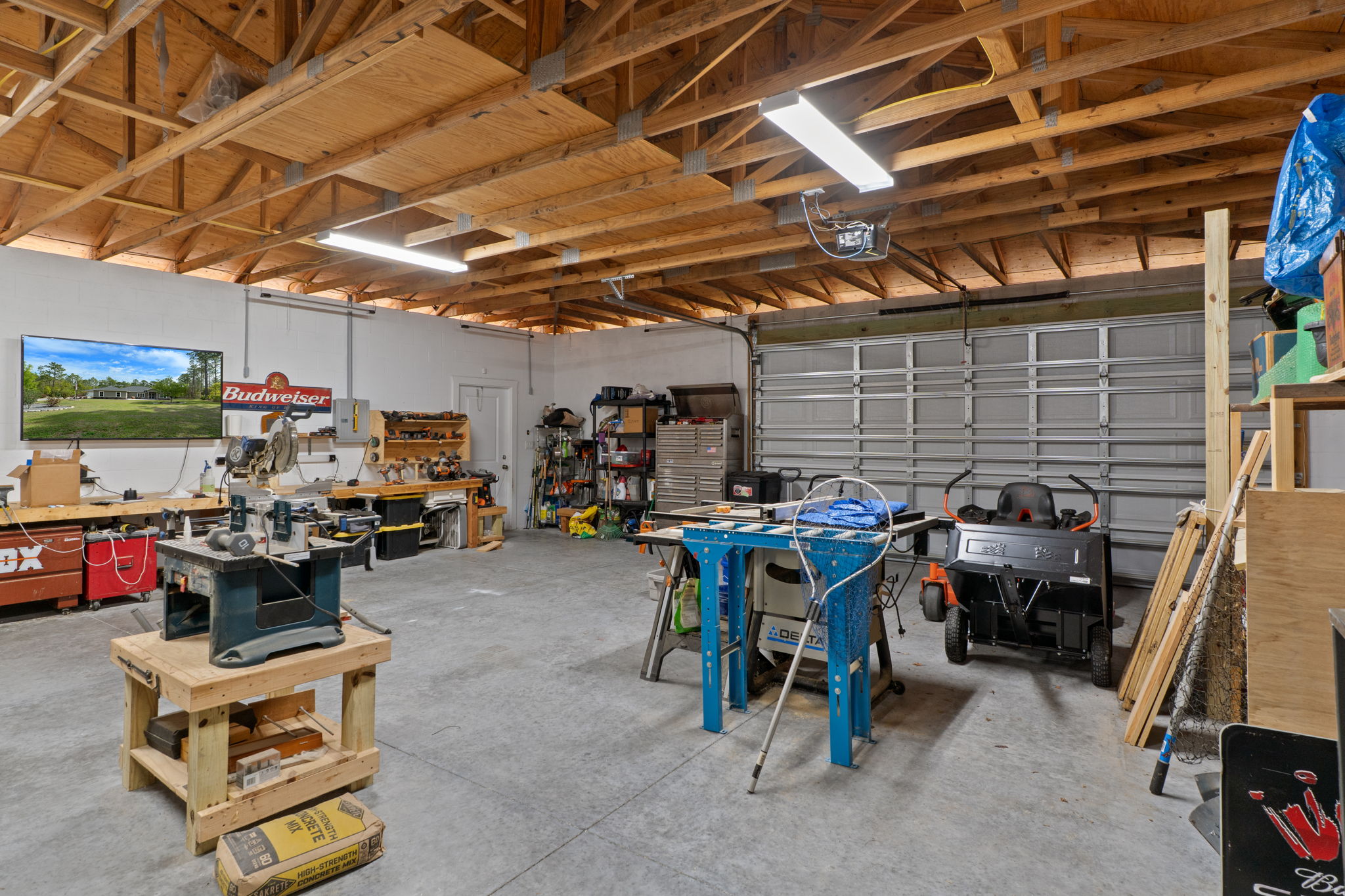 Opposite view of detached garage as a workshop.