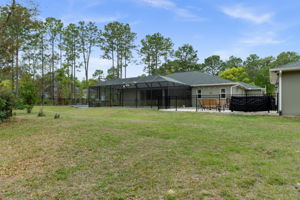 Looking from back of lot toward house from opposite corner.