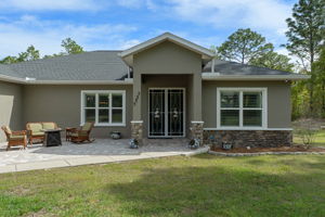 You'll appreciate the covered front double door entry.