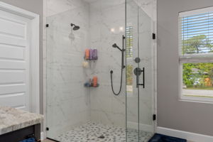 You'll love the large, frameless easy walk-in shower.