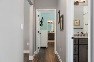 Looking down the guest hallway to the alternate ensuite guest bedroom.
