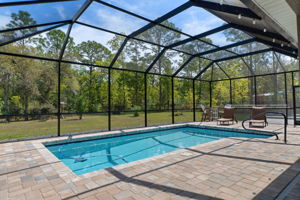 The heated saltwater pool surrounded by pavers is your own private oasis.