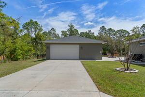 Detached 2+ car garage has interior dimensions of 28'3" x 28'11".