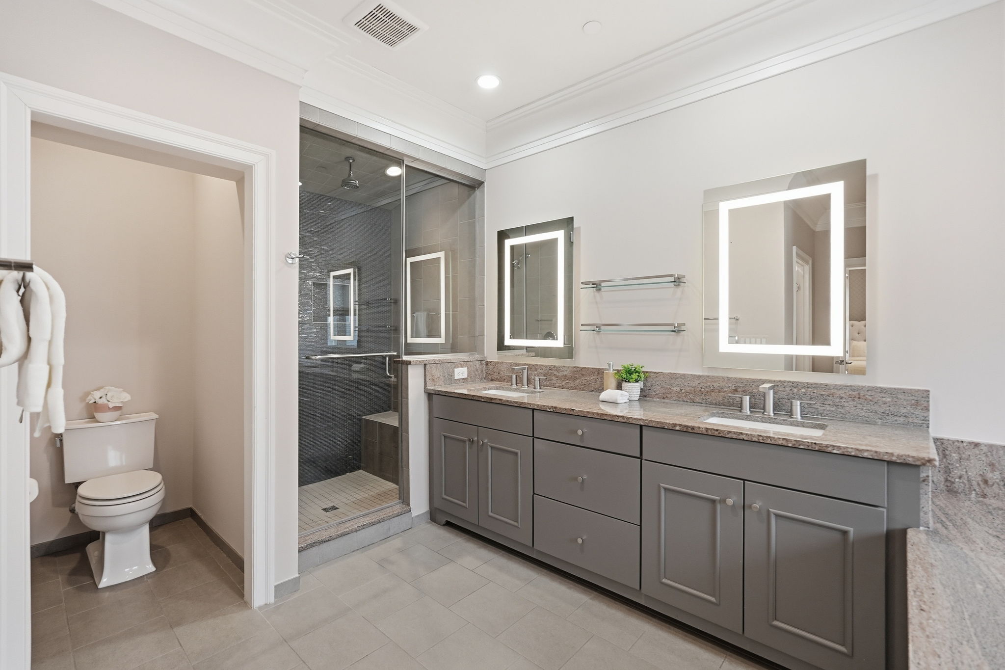 Primary Bathroom with Dual Vanities and Separate Shower