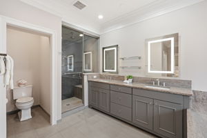 Primary Bathroom with Dual Vanities and Separate Shower