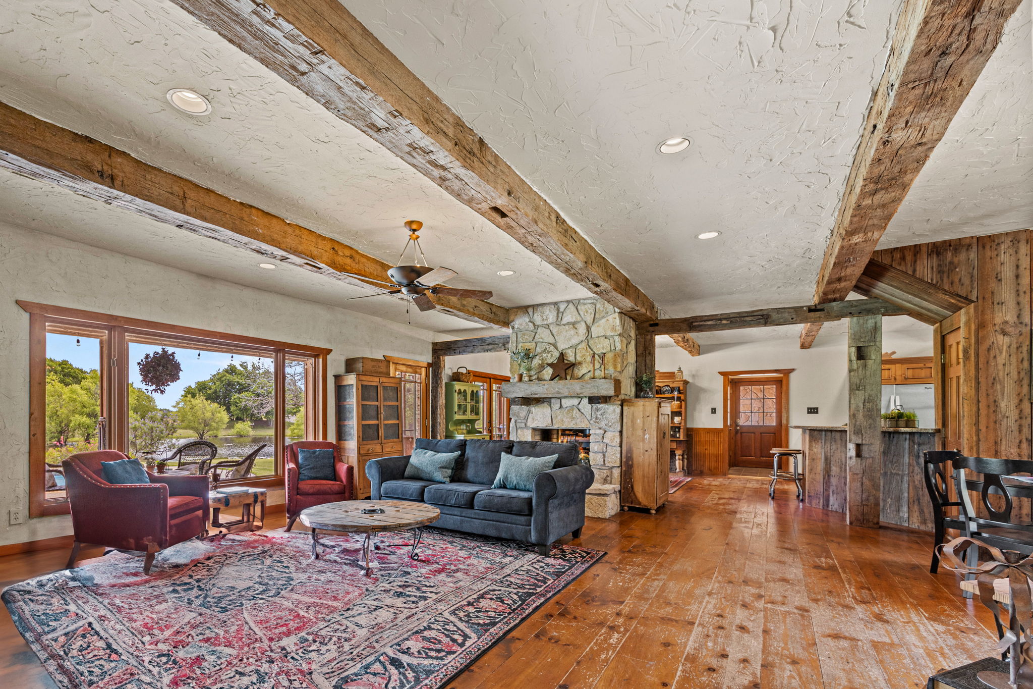 Great room with solid-oak beams and weathered pine floors