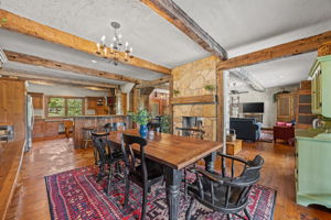 The opposite view of the great room--DR, LR, fireplace & kitchen