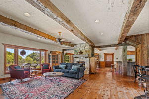 Great room with solid-oak beams and weathered pine floors