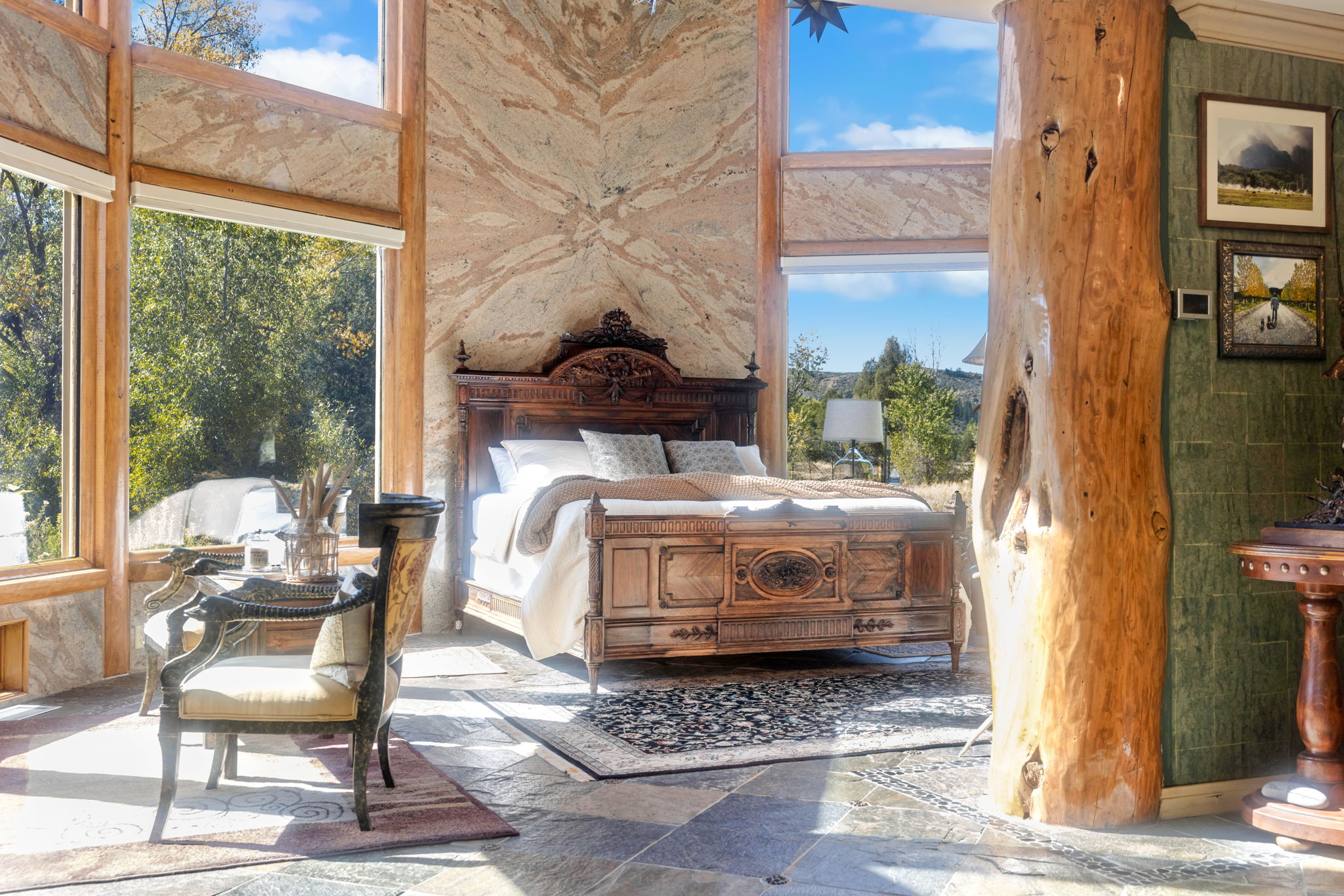 One of a kind granite walls and authentic imported lights from Mexico make this master bedroom unlike anything you've ever seen.
