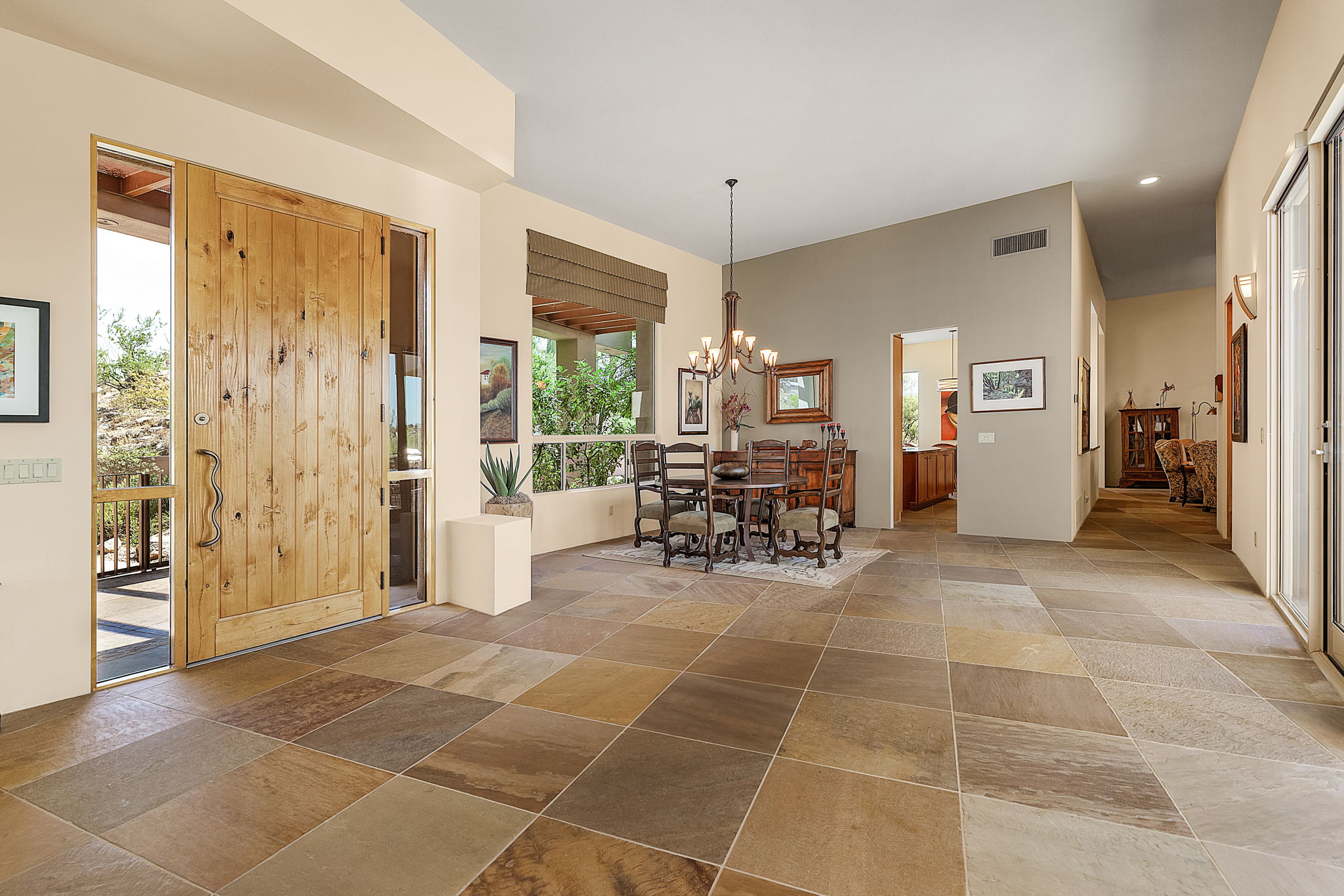 Stone flooring throughout (excluding the bedrooms).