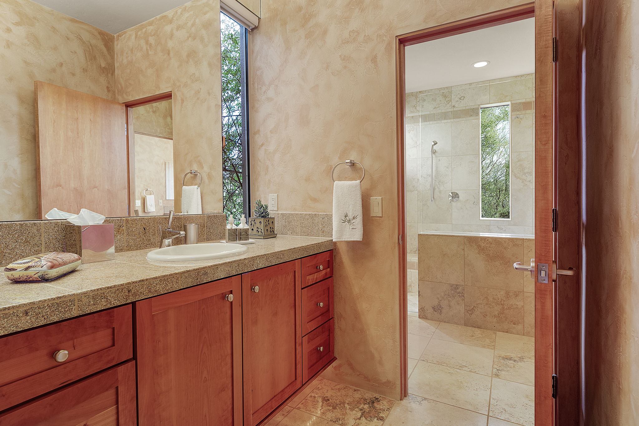 Bedroom 2 - Single sink vanity (shared shower).