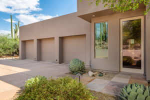 Attached 3 car garage with built-in storage cabinets. The exterior door offers direct access to the kitchen.