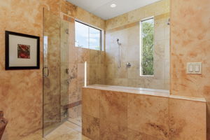 (BD 2 & BD 3) shared walk-in shower with dual shower heads and a bench seat.