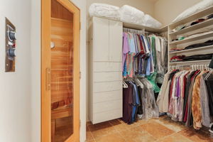 Spacious Custom Closet features a Sauna.