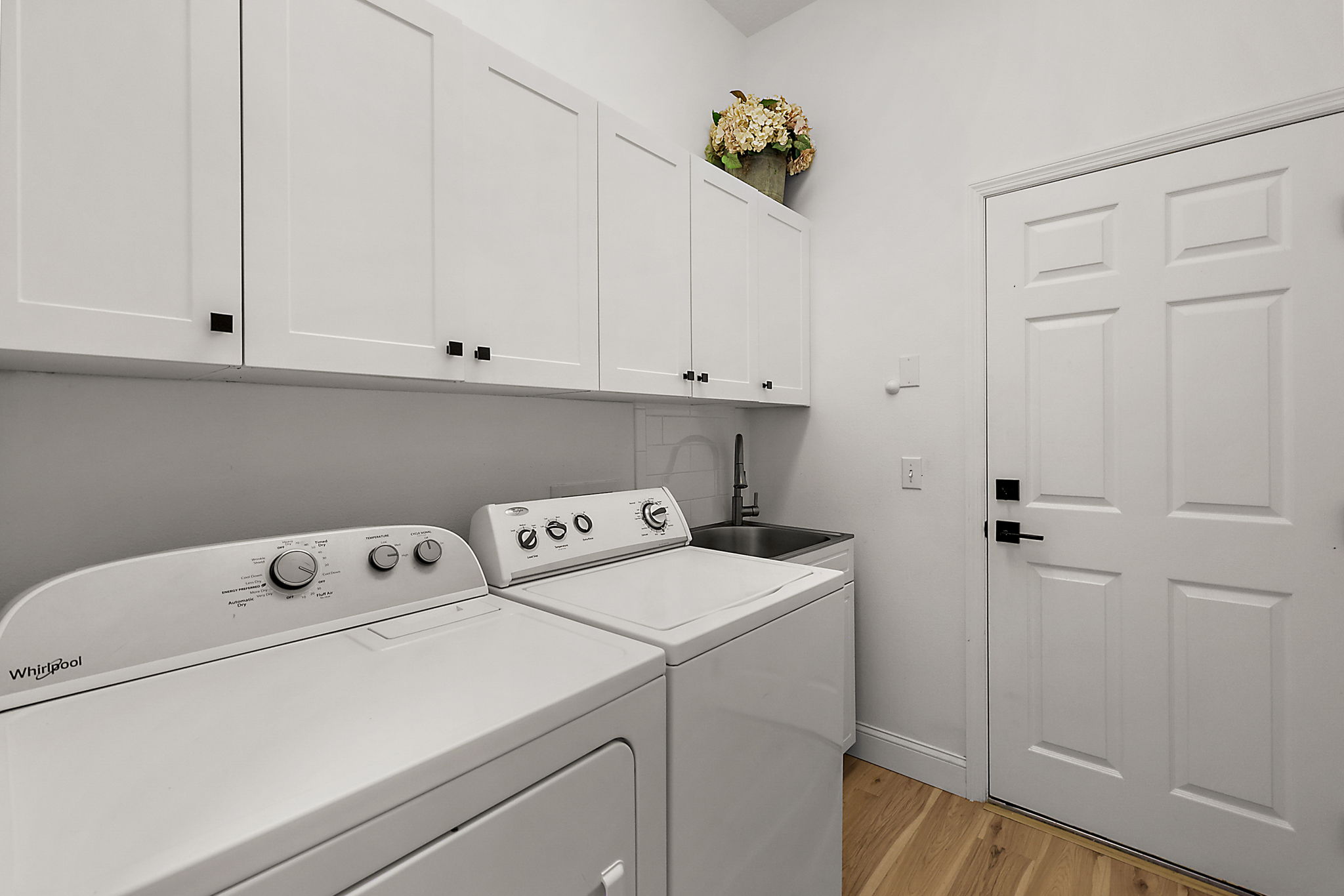 NTERIOR Laundry with White Shaker Cabinetry and Utility Sink