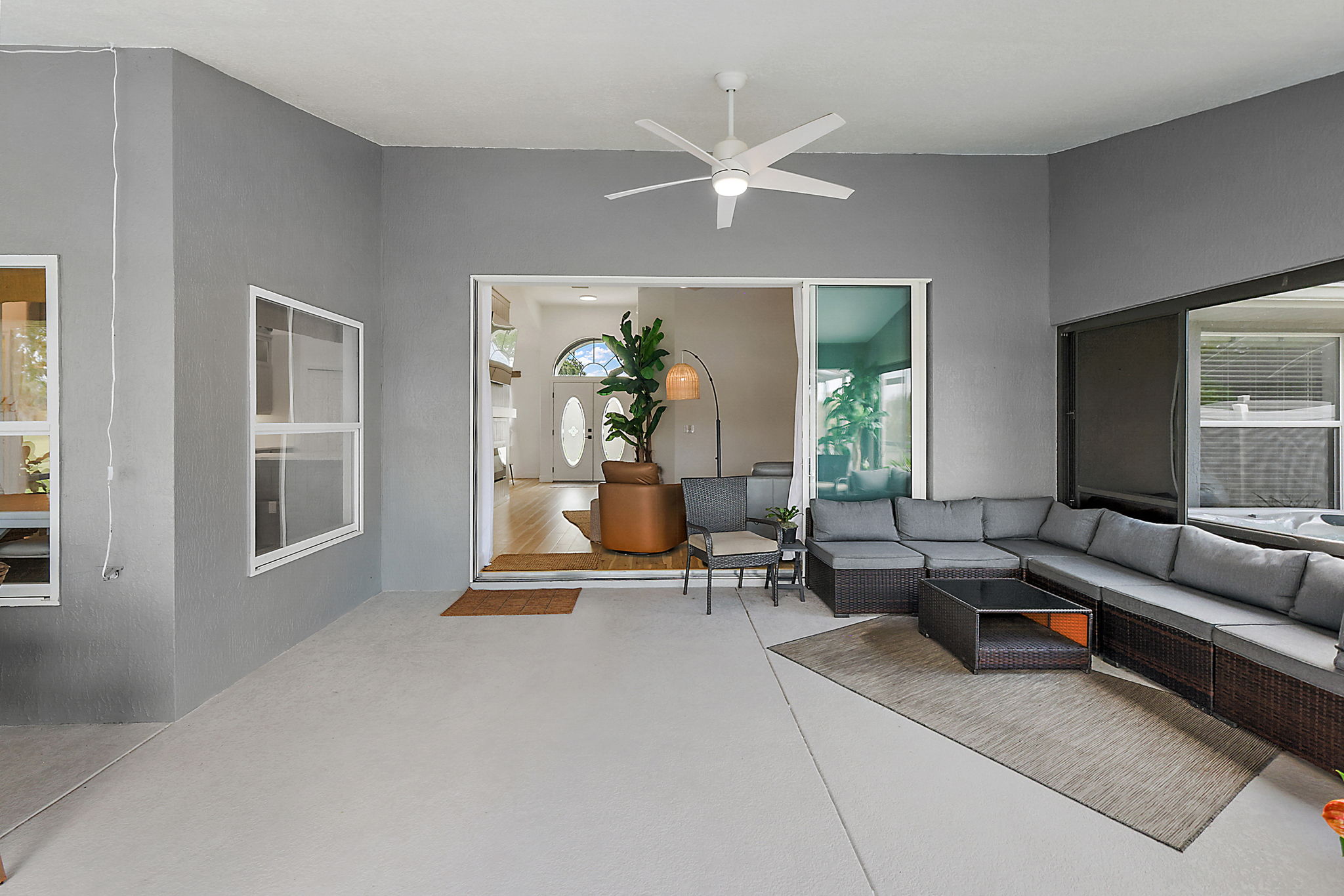 SPACIOUS Lanai Sitting Area with sliding side panels