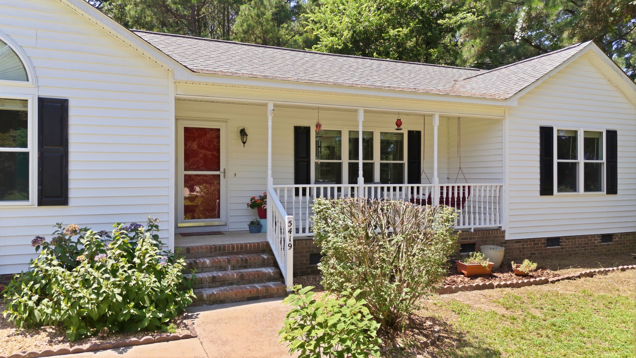 Covered front porch with classic charm