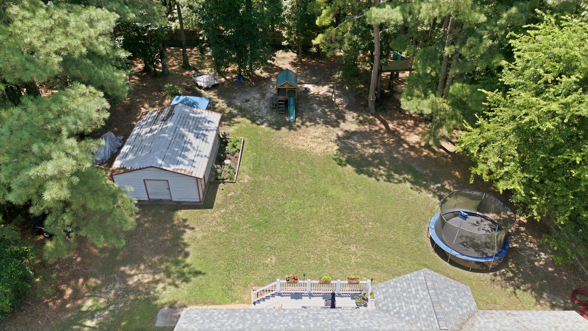 Aerial view of the expansive backyard