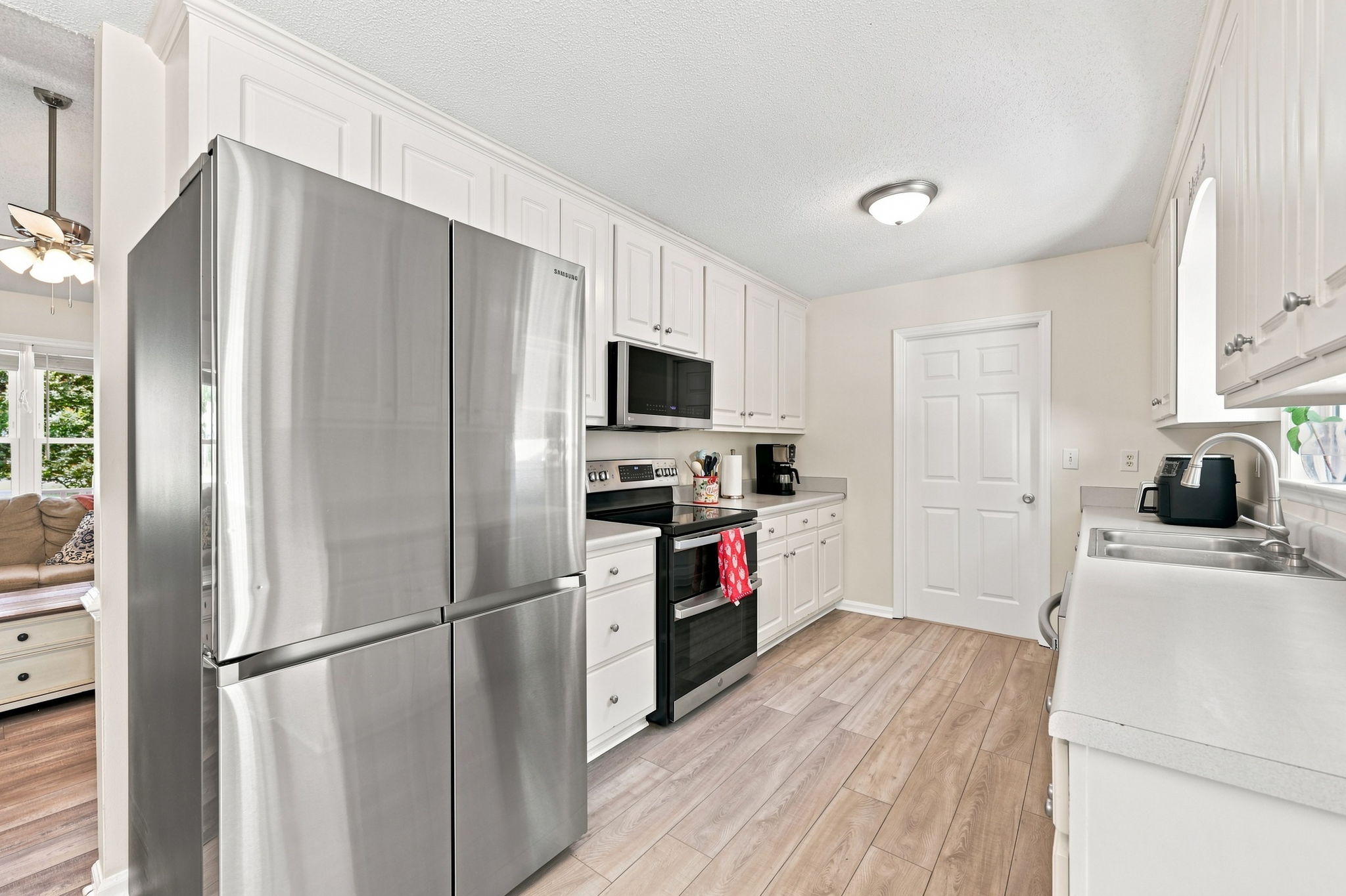 Bright kitchen with stainless appliances