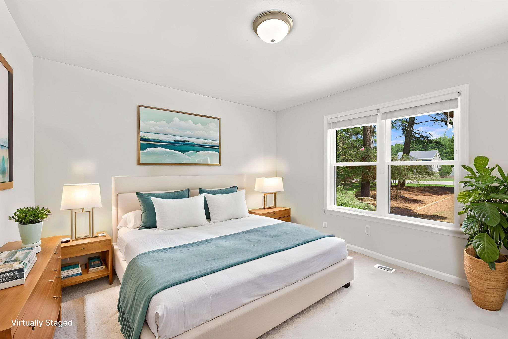 Bright secondary bedroom with large window