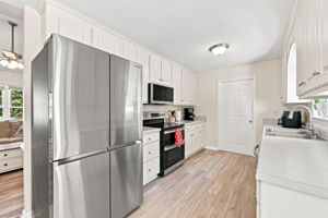 Bright kitchen with stainless appliances