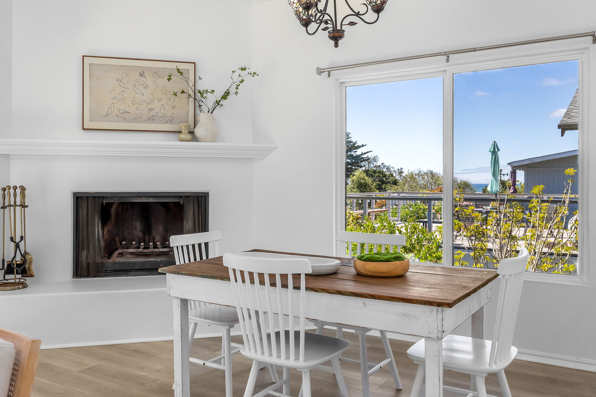 Dining area with fireplace.