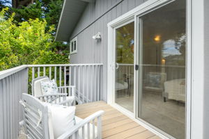 Deck with stair access of primary suite.