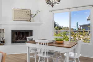 Dining area with fireplace.