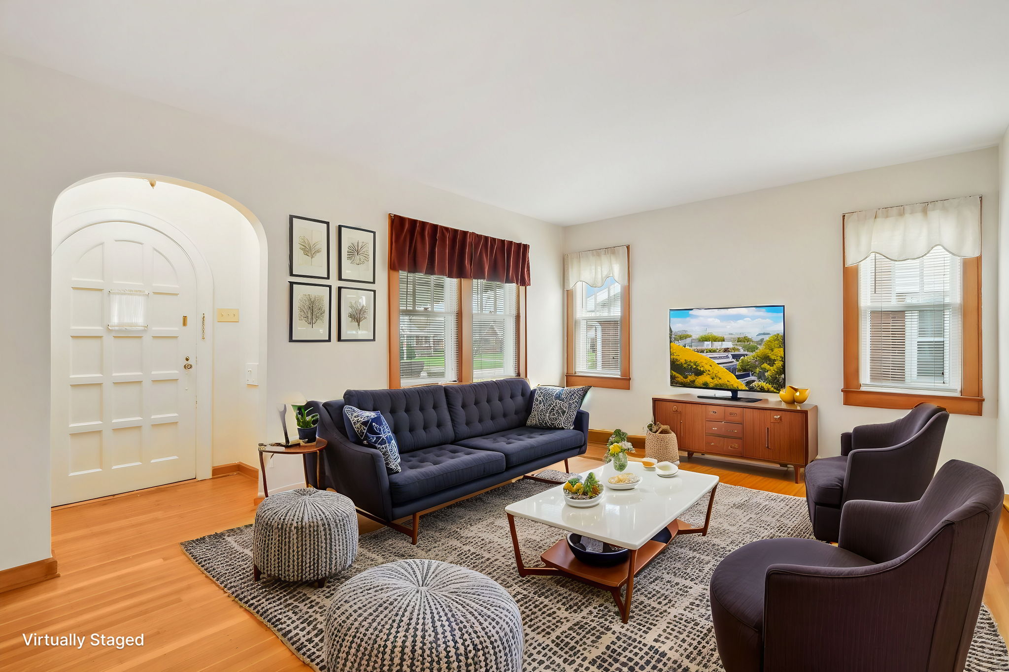 Virtuallly Staged Living room with original hardwood floors