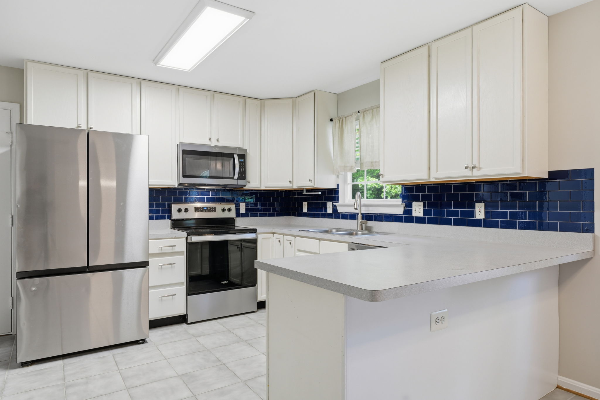 Eat-in Kitchen with Stainless Appliances