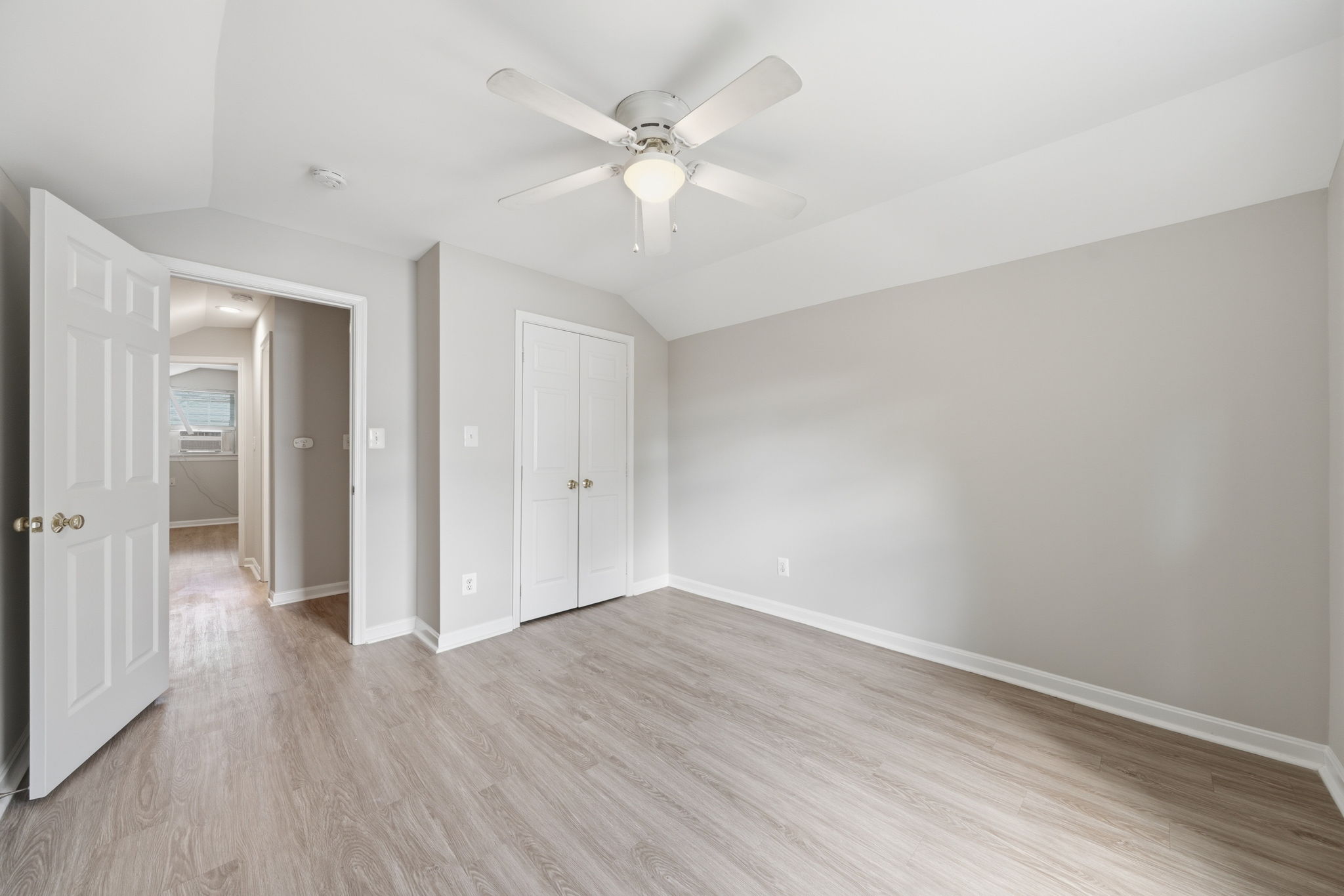 Upper level bedroom #1 with view of hallway