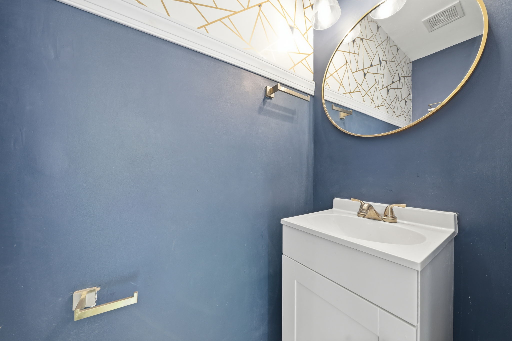 Half bathroom off of kitchen