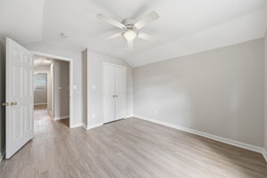 Upper level bedroom #1 with view of hallway